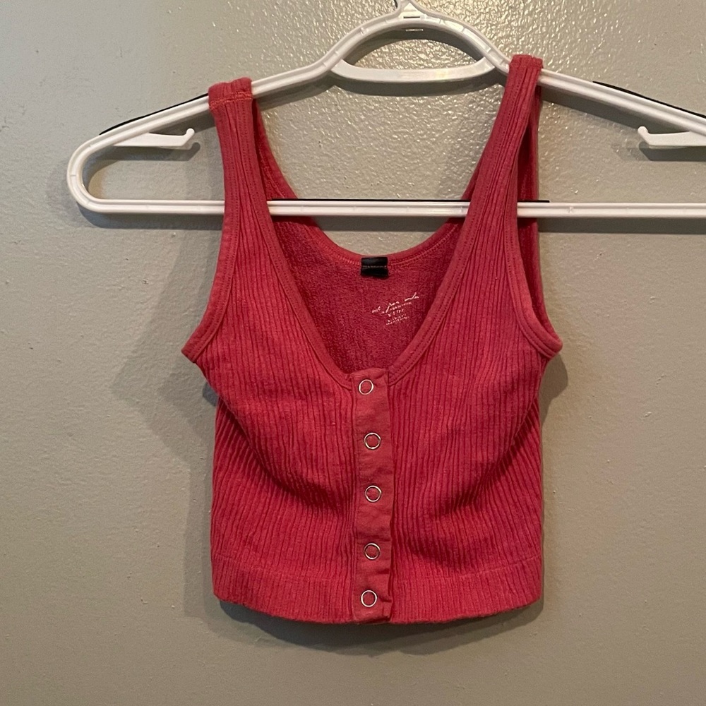 out from under pink button up crop top